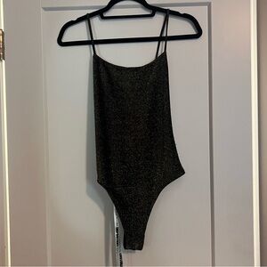 Brand new Mistress rocks gold black bodysuit